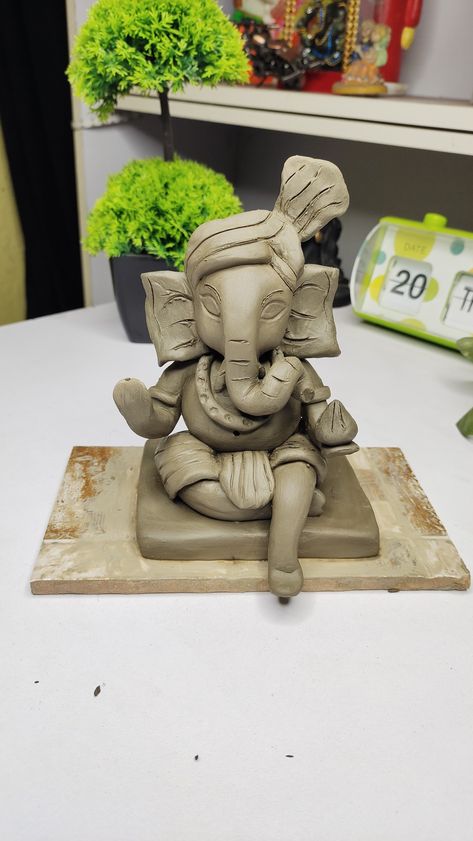 Ganpati Ganesha idol Easy Ganesha Making With Clay, Ganapati Bappa Idols, Ganesh Making With Clay Ideas, Diy Ganpati Idol, Ganesha Model With Clay, Handmade Ganesha Idol, Ganpati Clay Model Easy, Ganesh Ji Making With Clay, Ganesh Ji Sculpture