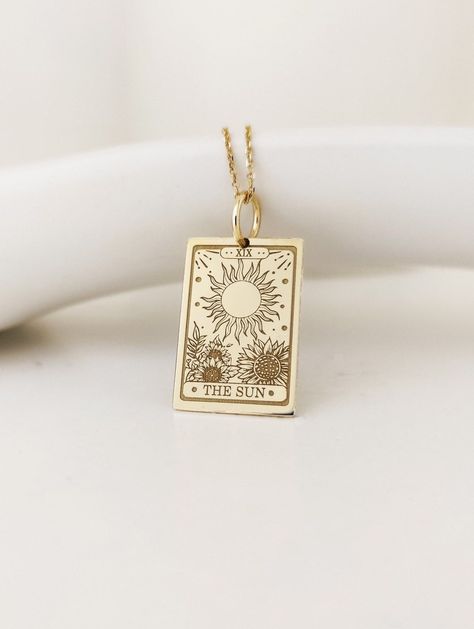 This Pendant Necklaces item by DaintyGoldJewels has 2571 favorites from Etsy shoppers. Ships from Greece. Listed on 10 Sep, 2023 Witch Tarot Card, Witches Tarot Cards, Tarot Necklace, Sun Tarot Card, Tarot Card Necklace, The Sun Tarot Card, The Sun Tarot, Witch Tarot, Card Necklace