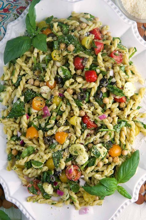 Easy Pesto Pasta Salad is the perfect dish for picnics, or a light lunch. This vibrant salad combines pasta, juicy tomatoes and basil pesto. Cypress Pasta Salad, Basil Side Dish Recipes, Essen, Easy Pesto Meals, Pesto Pasta Salad With Peas, Pasta Salad Summer Cold, Recipes With Basil Pesto Sauce, Whole Foods Pasta Salad, Pesto Pasta Salad Vegetarian