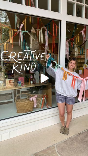 Tucson Gift & Paper Goods Shop on Instagram: "Y’all can’t seem to get enough of this window display and we love to see it! 💕  Here’s a tutorial for how Mara made this cute and simple ribbon bow garland in case you want to make your own version 🎀  This would be a great way to take advantage of the big sale at @michaelsstores - soo many options for ribbon sizes, colors and prints!" Wedding Shop Window Display, Bow Garland Tutorial, Cool Window Displays, Holiday Booth Display Ideas, Bows On Garland, Gift Shop Window Display, Ribbon Room Decor, Fall Ribbon Garland, Bow Garland Diy