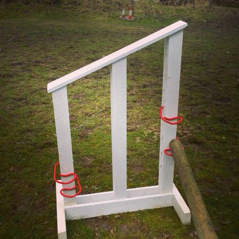 Homemade diy horse jump wooden. Tip for the future avoid slants, the angle was a pain and pre drill holes in the wood!!! Horse Jumps Diy Homemade, Diy Jumps For Horses, Schleich Horse Jumps Diy, Diy Cavaletti Jumps, How To Make Horse Jumps, Jump Wings, Cross Country Jumps, Horse Arena, Riding Arenas