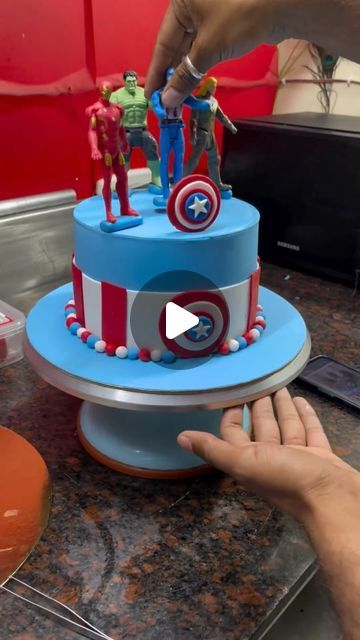 New Bits N Bites (Bakery & Cafe☕️ ) A Unique Teste on Instagram: "Avengers Theme Cake Design 🎂.  #avenger #avengers #avengerstheme #avengersthemecake #fondant #fondantcakes #fondantart #fondanticing #chirawa #jhunjhunu #bakery #chef #homebaker #bakerychef #cakeartists #cakedecoration #fondantcakedecoration #reels #instacake #viral #viralvideos #trending" Avenger Theme Cake, Avenger Birthday Cake, Avengers Cake Ideas, Marvel Cake Ideas, Spiderman Birthday Cake Ideas, Avengers Cake Design, Avengers Themed Cakes, Avengers Birthday Cake, Avengers Theme Birthday