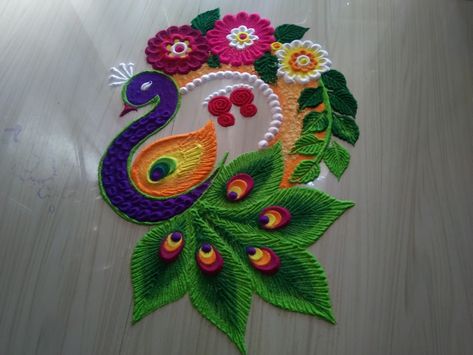 Shiddis rangoli art Rangoli Designs Morpankh, Peackok Rangoli Design, Pickock Rangoli, Diwali Rangoli Designs Unique Peacock, Beautiful Rangoli Designs Peacock, Pecock Model Rangoli, Rangoli Designs Peacock Latest, Best Rangoli Designs Diwali Unique, Simpal Rangoli Designs Diwali