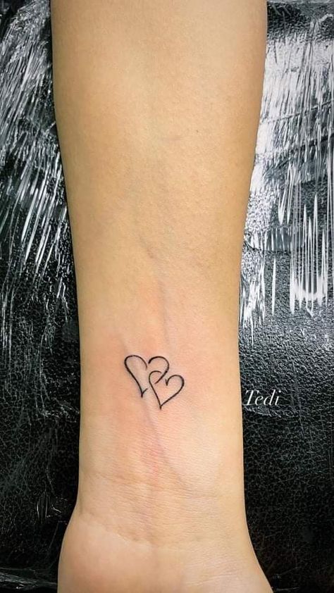 Small 2 Heart Tattoo, Heart Tattoo For Mom And Daughters, Small Heart Tattoo On Wrist Mother Daughters, Double Heart Wrist Tattoo, Double Heart Tattoo With Initials, Two Love Heart Tattoo, Small Heel Tattoos For Women, Tattoo Ideas Female Initials, Cute Simple Heart Tattoos