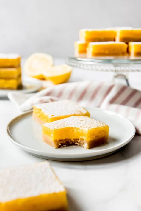 These Easy Lemon Bars have a buttery shortbread crust with a deliciously sweet and tart layer of silky lemon curd baked on top! Dust them with a generous sprinkle of powdered sugar for a beautiful finish and you've got a dessert bar that is party ready in no time! @houseofnasheats #lemons #lemonbars #bars #dessert #fresh #easy #fromscratch #homemade #best Dairy Free Lemon Bars, Gooey Lemon Bars, Perfect Lemon Bars, Construction Cookies, Classic Lemon Bars, Homemade Shortbread, Lemon Bars Easy, Almond Pound Cakes, Citrus Recipes