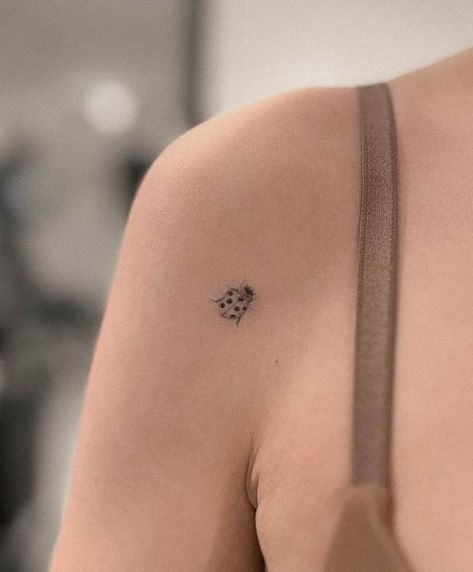 Ladybug Tattoo On Shoulder, Ladybug Tattoo Behind The Ear, Small Tiny Tattoos For Women, Dainty Ladybug Tattoo Black, Small Ladybug Tattoo Fine Line, Ladybug Tattoo Ankle, Ladybug Shoulder Tattoo, Minimal Ladybug Tattoo, Lady Bug Tat