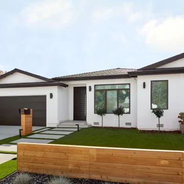 Black Roof Tiles White House, Black And White Exterior House Modern Flat Roof, White And Black Bungalow Exterior, Black And White Facade House, Tile Roof House Exterior Colors Modern, Flat Roof Ideas House Exterior, White Exterior Black Roof, Render House Exterior, House Repainting Exterior