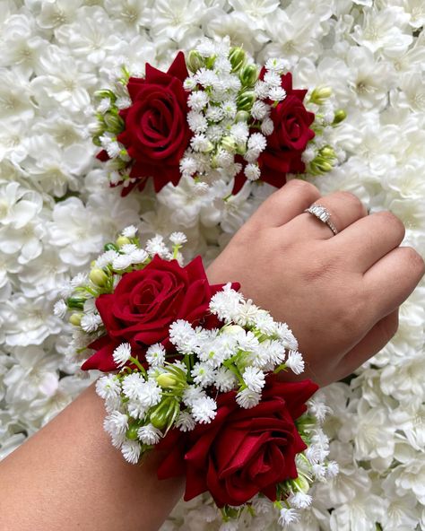 Take a look at our range of most popular range of bridal bracelets also worn by our bridesmaids. The best thing about them is how they mimic fresh flower bracelets so well as our brides have said themselves😉. Ranging from light red tones to deep red tones! Also available in different sizes and prices fit for your budget🥰. #nikkah #flowerjewellery #nikkahceremoney #florals #mendhi #wedding #floraljewellery #floralbracelets #flowerbracelets #trending #bridal #bride #bridesguide Haldi Ornaments For Bride, Flower Bracelet Wedding, Bridesmaid Indian, Flower Jewellery For Mehndi, Bridal Bracelets, Fresh Flower Jewelry, Latest Bridal Lehenga Designs, Flower Jewelry Designs, Wedding Flower Jewelry