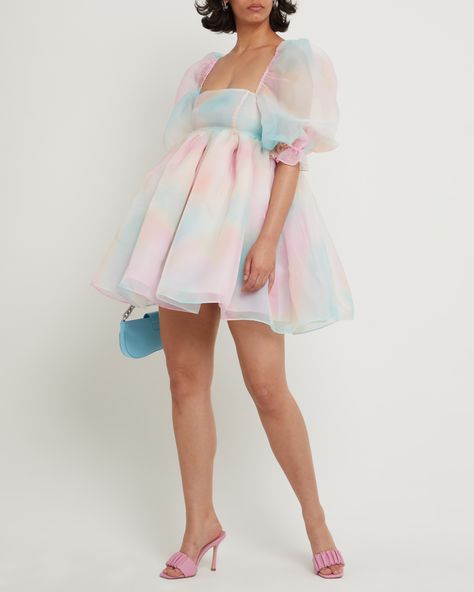 Price Comparison Few Moda $79 Alice + Olivia $395 Selkie $295 Product Details Oh so flouncy, this fun mini dress is a dream come true. Done in a babydoll silhouette with exaggerated puff sleeves.- Back zipper- Layered sheer fabric- Content: 100% Polyester Style# T22WDR12157 Fit Notes - Model wearing a size - Model measurements: Size Length Bust Waist XS 67 82 72 S 68 86 76 M 69 90 80 L 70 94 84 XL 71 98 88 Pastel Babydoll Dress, Puff Dress Outfit, Pastel Dresses Short, Pastel Dress Outfit, Eras Tour Lover Outfit, Lover Era Outfits, Lover Eras Tour Outfit, Pastel Rainbow Dress, Selkie Dress