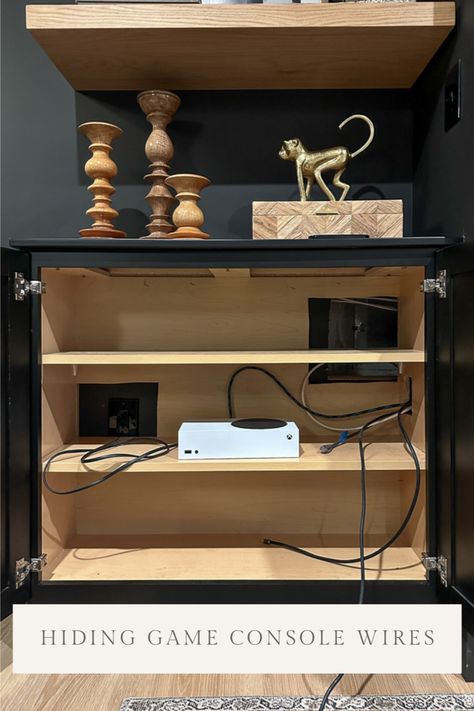 came consoles in a cabinet with hidden wires How To Hide Game Consoles, Hidden Game Console, Hide Tv, Hidden Games, Basement Fireplace, Hidden Tv, Brass Cabinet Hardware, Lvp Flooring, Cable Management System