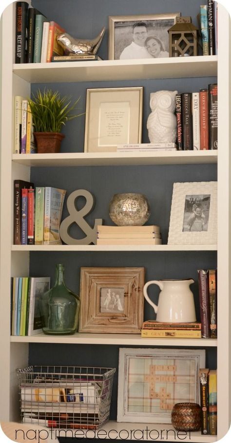 While these items aren't necessarily what would go with your decor, they show how to use a nice variety of items to style a bookcase. Your eye wants to bounce around and see everything! Styling Mantle, Decorating Bookcases, Styling Bookcases, Styling A Bookcase, Ikea Black, Mantle Decorating, Styling Bookshelves, Decorating Bookshelves, Bookcase Styling