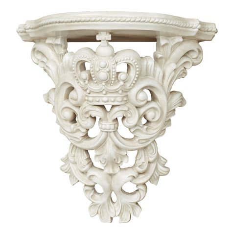 PRICES MAY VARY. Traditional polystone floating wall shelf Has an openwork design Features crown, srolls, acanthus leaves, and rope trim Has an antique white finish Measures 11 inches wide x 6 inches deep x 10.5 inches high The Crown Imperial Antique White Wall Shelf royally displays your items with regal flair. The openwork polystone accent features a crown, scrolls, acanthus leaves, and rope trim. Measures 11"Wx6"Dx10.5"H. Small Victorian Cottage Interior, Victorian Cottage Interior, Vintage Shelves, Crown Imperial, Shelves For Bedroom, White Wall Shelves, Corbel Shelf, Hallway Office, White Victorian