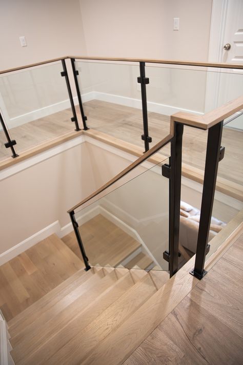 Stair, modern, home, glass railings, metal, posts, glass panels, staircase, design, style, farmhouse, Glass Stairways Modern, Modern Stairs With Glass Railing, Metal And Glass Staircase, Black Metal Interior Stair Railing, Interior Glass Railing Ideas, Stairway Hallway Decor, Glass Loft Railing, Black And Glass Staircase, Indoor Glass Railings