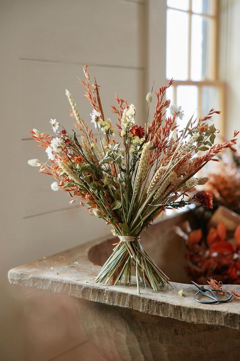 A beautiful gift or long-lasting natural adornment for your own home, this large-scale bouquet features a colorful mix of dried botanicals including strawflowers, safflowers, wheat, and eucalyptus. Wheat Wedding, Prairie Wedding, Dried Botanicals, Fall Floral Decor, Dried Wheat, Rustic Bouquet, Fall Arrangements, Fruit Flowers, Wildflower Bouquet