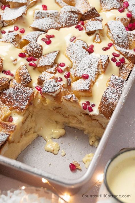 Eggnog bread pudding is the quintessential holiday breakfast and dessert. Warmly spiced with notes of nutmeg, vanilla, and cinnamon, this delicious recipe is tender thanks to a rich eggnog custard. You’ll love it for Thanksgiving and Christmas morning brunch! It’s simple to assemble with just 15 minutes of hands-on prep and requires easy-to-find ingredients that you probably already have on hand. Makes a lot of servings perfect for entertaining and feeding a crowd. | CountryHillCottage.com Eggnog Desserts Christmas, Baileys Bread Pudding, Egg Nog Bread Pudding, Desserts With Eggnog, Thanksgiving Dessert Bread, Eggnog Custard, Bread Pudding Thanksgiving, Eggnog Banana Bread, Winter Bread Pudding