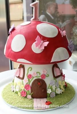 Homemade Mushroom Cake: This Mushroom cake was for my daughter's first birthday - a real labor of love! It's a chocolate cake (with a box of dark chocolate Lindt balls mixed in Fairy House Cake, Toadstool Cake, Mushroom Cake, Fairy Birthday Cake, House Cake, Fairy Cakes, Homemade Cake Recipes, Mushroom House, Childrens Birthday Cakes