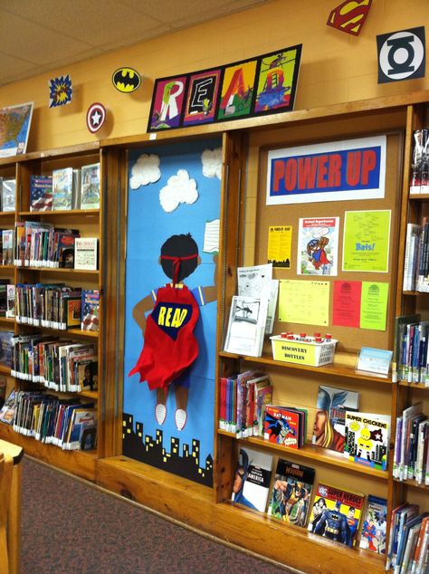 Power Up...Read! display at the Mt. Healthy branch library. Look at that cape blowing in the wind! Superhero School Theme, Room Door Ideas, Superhero School, Reading Display, Superhero Classroom Theme, Class Door, Library Themes, Superhero Classroom, Super Hero Theme