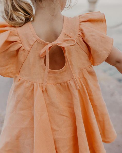 🍑 PEACH LINEN the sweetest set of Flutter Sleeve Tie Back Blouse with “Bouquet 2” embroidery and Bermuda Shorts in Peach linen 🍑 beautiful photos by @juliadukephoto Kids Linen Clothes, Girls Linen Dress, Baby Fashion Newborn, Tie Back Blouse, Baby Dress Design, Baby Dress Patterns, Girl Inspiration, Girls Dresses Summer, Fashion Kids