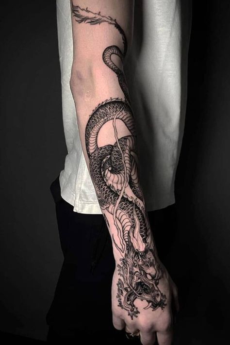 Explore the best meaningful forearm tattoo ideas for men with designs that carry deep significance. Small Tattoos For Men Meaningful, Wrap Around Tattoo Men, Dragon Tattoo On Forearm, Sleeve Tattoo Ideas Men, Inner Forearm Tattoo Men, Dragon Tattoo Wrapped Around Arm, Dragon Tattoo Forearm, Arm Tattoos For Women Forearm, Japanese Tatto