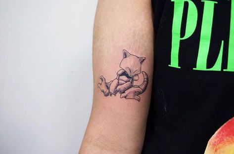 Small Pokemon (Abra) on the upper arm done @hontattoostudio Abra Tattoo Pokemon, Abra Tattoo, Abra Pokemon, Small Pokemon, Tattoos 2023, Pokemon Tattoos, Pokemon Tattoo, Matching Tattoo, Cartoon Tattoos