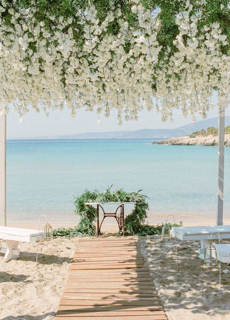 This hidden beach in Argolida, Greece is a breathtaking location for a beach wedding.  Photo: Les Anagnou Photographers Korean Beach Wedding, Argolida Greece, Blair Wedding, Beach Wedding Setup, Beach Wedding Aisles, Intimate Beach Wedding, Wedding In Greece, Dream Beach Wedding, Wedding Decors