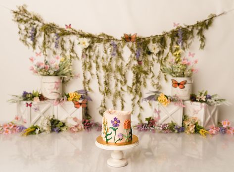 Flower Smash Cake Photoshoot, Wild Flower Birthday Decorations, Floral Garden Cake Smash, Wildflower Cake Smash Photography, Wildflower Cake Smash Photoshoot, Flower Smash Cake First Birthdays, Wild Flower First Birthday Photoshoot, Wild Flowers Birthday, Wildflower First Birthday Party Decor