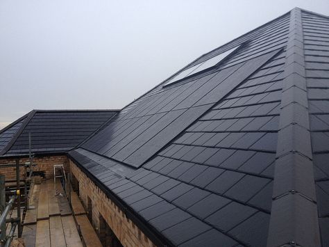 Super smart! This slate roof has GSE roof integrated solar system with Sunrise 250W 40mm thick all-black panels. In Roof Solar Panels, Integrated Solar Panels, Solar Panel Roof Design, Solar Panels On Roof, Solar Roof Tiles, Black Roof, Solar Panels Roof, Pv Panels, Solar Energy Panels