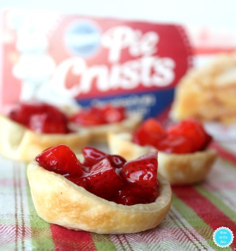 Four Ingredient Mini Strawberry Pies | Mom on the Side Individual Strawberry Desserts, Individual Fruit Pies, Mini Strawberry Pies Muffin Tins, Mini Strawberry Pies, Strawberry Pie Glaze, Strawberry Cream Cheese Pie, Mini Pie Crust, Mini Strawberry Cheesecake, Strawberry Cheesecake Bites