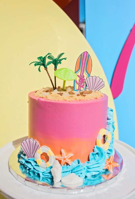 Layla's Malibu Barbie Birthday Party | CatchMyParty.com Barbie Beach Party Outfit, Barbie Cake One Tier, Hawaiian Barbie Cake, Malibu Beach Party Theme, Malibu Barbie Party Invitation, Barbie Malibu Birthday Party Cake, Barbie Pool Party Birthday Cake, Barbie Palm Tree, Malibu Barbie Pool Birthday Party