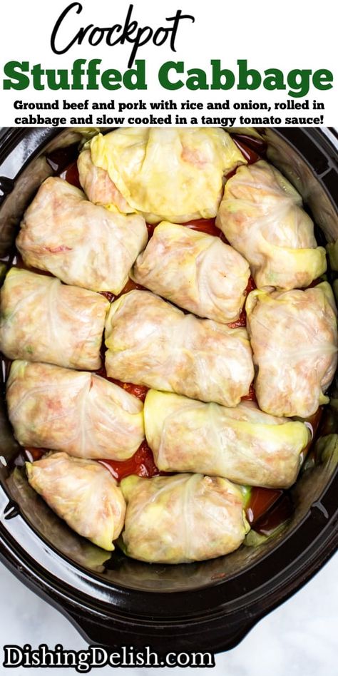 Crockpot Cabbage Rolls are the perfect comfort food, made with ground beef and pork mixed with rice, onion, and spices rolled in cabbage leaves and slow cooked in a tangy tomato sauce! Beef And Sausage Cabbage Rolls, Old Fashion Cabbage Rolls Ground Beef, Cabbage Roll Crockpot, Cabbage Rolls In The Crockpot, Cabbage Rolls Recipe Easy Crock Pot, Stuffed Cabbage Rolls In Crock Pot, Stuff Cabbage Rolls Recipes Crock Pot, Stuffed Cabbage In Crock Pot, Stuff Cabbage Rolls Recipes Beef