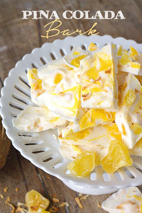 Pina Colada Bark, a delicious and easy candy bark made with toasted coconut and dried pineapple. A tropical escape you can take with you anywhere! - ThisSillyGirlsLife.com #PinaColada Candy Bark Recipes, Easy Candy, Alcoholic Desserts, Dried Pineapple, Candy Bark, Boozy Desserts, Dessert Simple, Candy Recipes Homemade, Bark Recipe