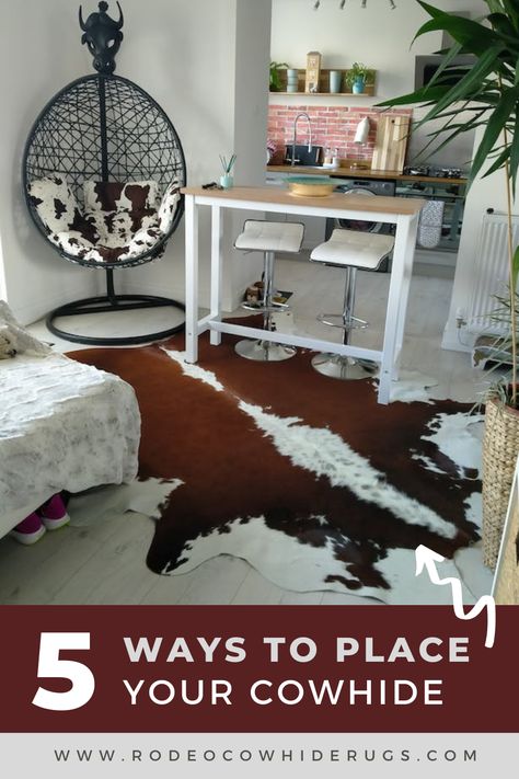 Transform your space with the timeless elegance of a genuine cowhide rug! 🌟 Discover 5 stylish ways to place this versatile decor piece – from center stage in the living room to a chic hallway runner. Elevate your home with the unique patterns and luxurious feel of cowhide. 🏡✨ #HomeDecor #CowhideRug #InteriorDesignInspo" Cowhide Rug In Living Room, Cowhide Rug Office Decor, Cowhide Entryway, Cow Skin Rug Living Room, Cowhide Rug Office, Cowhide Rug Living Room Modern, Cowhide Rug Living Room, Cow Rug, Cow Skin Rug