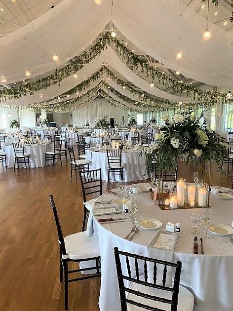 Ceiling draping with greenery for a wedding Ceiling And Wall Draping Wedding, Window Draping Ideas, Wedding Party Indoor, Wedding Decorations Ceiling, Venue Ceiling Decoration, Low Ceiling Wedding Reception, Indoor Hall Wedding Decor, Debut Venue Design Simple, Wedding Locations Indoor