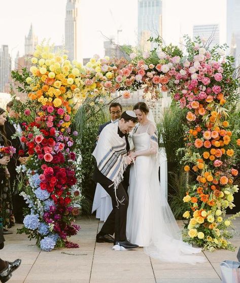 Colorful Rooftop, Wedding Chuppah Flowers, Huppah Wedding, Chuppah Flowers, Wildflower Wedding Theme, Wedding Chuppah, Bright Wedding Colors, Neutral Wedding Flowers, Fiesta Wedding