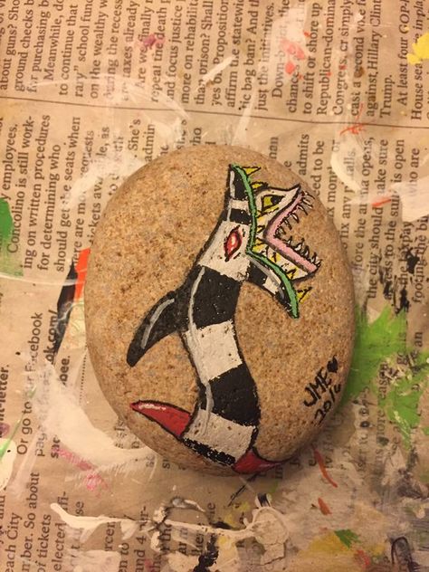 Beetlejuice painted rock Beetlejuice Painted Rocks, Beetlejuice Painting, Beetlejuice Christmas, Beatle Juice, Arts And Crafts Aesthetic, Crafts Aesthetic, Rock Creations, Rock Designs, Halloween Things