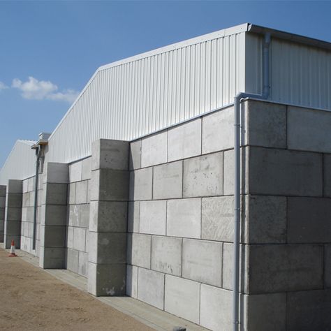 Industrial buildings - interlocking concrete blocks with steel roof constructions - Legioblock EN Concrete Warehouse, Air Crete, Industrial Building Design, Interlocking Concrete Blocks, Concrete Block House, Tin Roofing, Glass Roofing, Roofing Colors, Deck Landscaping