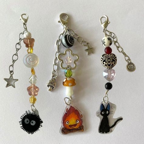 studio ghibli drop ≽ܫ≼ 🧺🍃🍵 drop is live 𓇢𓆸 dm to buy/comment u can access the items on my website (fairyme.shop) or through dms necklaces are about $40/50 (exceptions apply) complex ones are more ($80/90) keychains are around $20 𖦹 necklaces 🍀⛩️🎋🏯 kiki’s delivery service (avail) ponyo (avail) when marnie was there (avail) spirited away - chihiro (avail) spirited away - no face & yubaba (avail) totoro (avail) howl’s moving castle (avail) spirited away - haku (avail) princess mononoke - tr... Princess Mononoke, Howl's Moving Castle, Studio Ghibli Inspired Jewelry, Marnie Was There, Tree Spirits, When Marnie Was There, Soot Sprite, No Face, Howls Moving Castle