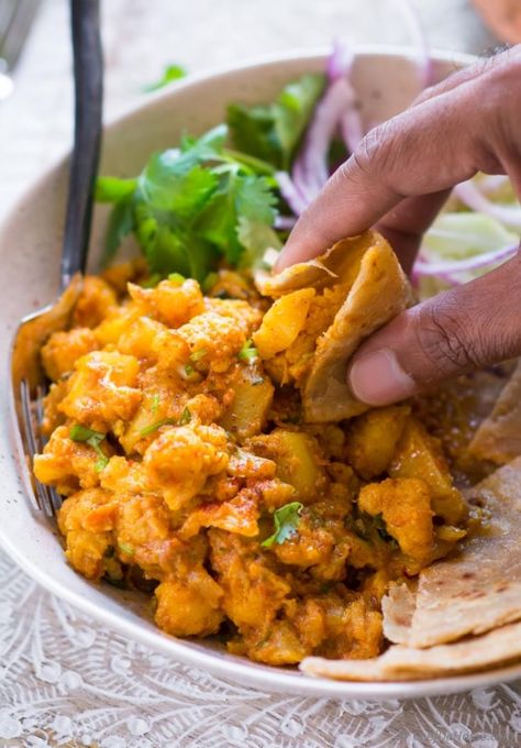 Aloo Gobi Recipe | chefdehome.com Ali Gobi Recipe, Hare Krishna Food Recipes, Subji Indian Dishes, Aloo Gobi Recipe Authentic, Hare Krishna Recipes, Alo Gobi Recipe, Alo Gobi, Aloo Gobi Recipe Punjabi, Pureed Vegetables