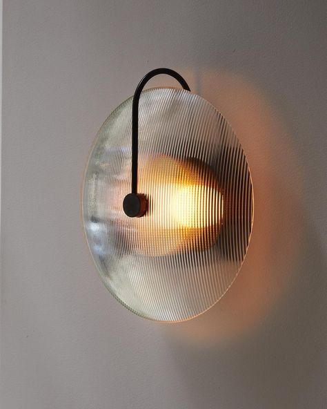 ADA Aperture Sconce with Skytek Glass in the showroom Gold Light Fixture, Lampe Art Deco, Wall Lamps Living Room, Led Wand, Black Wall Lamps, Indoor Lighting Fixtures, Glass Wall Lights, Art Deco Lamps, Nordic Modern