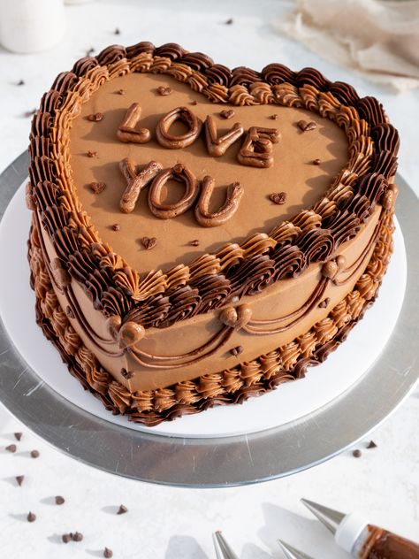 This heart shaped chocolate cake recipe makes two, tender cake layers that are frosted with homemade chocolate buttercream. Chocolate Heart Cakes, Heart Shaped Cake Pan, Cake Wallpaper, Chocolate Cake Designs, Heart Shaped Chocolate, About Heart, Heart Shaped Cakes, Valentine Cake, Valentine Chocolate