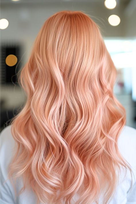 These waves flow with the soft, luxurious luster of rose gold, striking a perfect balance between pink and golden hues. The gentle waves add a romantic flair, evoking the delicate petals of a rose. It’s an elegant and trendy color that exudes warmth and sophistication. Click here to see more stunning red hair color ideas.