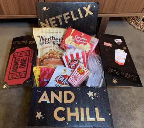 Netflix and Chill Care Package- Air Force deployment, movie night care package, admit one card, popcorn and favorite movie theater candies/snacks Netflix And Chill Basket Ideas, Netflix And Chill Snacks, Movie Night Care Package Ideas, Movie Night Care Package, Movie Care Package Ideas, Netflix And Chill Box Gift, Movie Night Valentines Gift, Netflix And Chill Gift Basket Ideas, Netflix And Chill Birthday Party