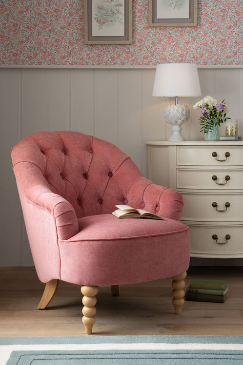 Complement your home with the stylish yet classic Hanby accent chair from Laura Ashley. A welcome addition to any room, this elegantly curved chair with a deep buttoned back and scroll arm details boasts style and superior craftsmanship. Adding to its charm this accent chair features expertly shaped bobble legs. Bedroom Chairs Ideas, Pink Chair Bedroom, Pink Furniture Bedroom, Pink Accent Chair, Curved Chair, Popular Paint Colors, Green Curtains, Old Rose, Chic Interior