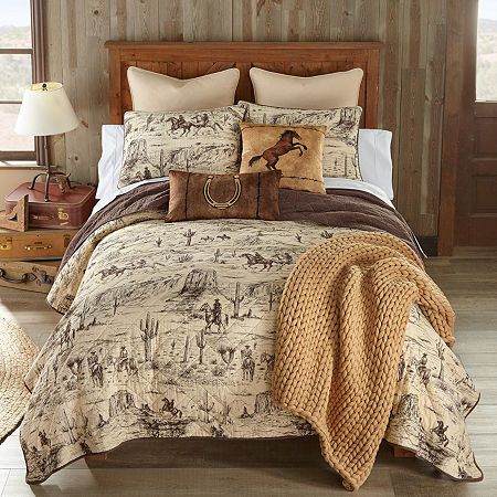 Saddle up for style and get ready to embark on a wild west adventure with the donna sharp cowboy cotton quilt set. This striking bedding ensemble captures the rugged spirit of the frontier with its captivating whole cloth design. Featuring sketched cowboy figures, graceful horses, and iconic cacti set against a desert landscape backdrop, the cowboy quilt set transforms your sleeping space into a western oasis. With a color palette of rich chestnut brown and soft cream, this quilt set evokes the warmth and earthy charm of the desert landscape. This bedding ensemble serves as a captivating reminder of the untamed beauty of the American southwest. 100% cotton, 50/50 cotton/poly fill. Prewashed to prevent shrinkage and fading. Machine wash cold, do not bleach, tumble dry low. Each set includes Western Comforters, Western Quilts, Cowboy Quilt, Western Rooms, Western Bedding, Bed Ensemble, Western Bedroom, Cotton Quilt Set, Cloth Design