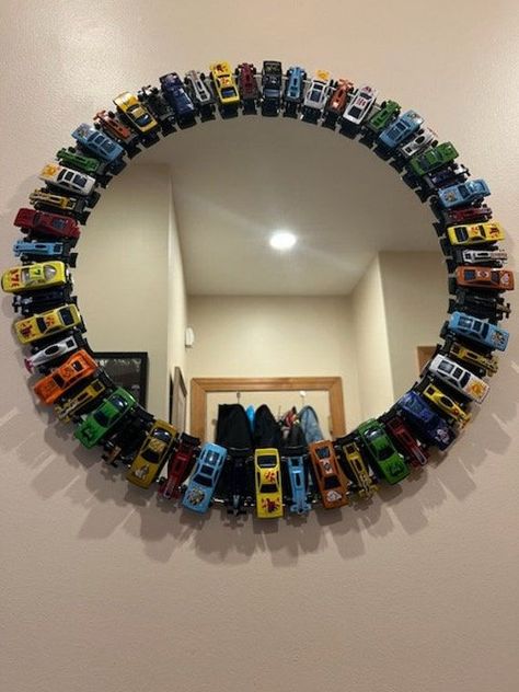 NOT SOLD OUT. MADE TO ORDER  Custom Mirror made from scratch surrounded by hot wheel style toy cars. Awesome gift for yourself or anyone that loves cars! This is a very durable mirror made with superior apoxy. This is a heavy duty mirror and not meant to be a toy for child to play with. SHIPPING IS NOT FREE- app wont allow me to revise. Shipping TBD depending on what speed you require.  i.e.  ground, 2 day , etc.#StorageSolutionsForKidsRooms #SmallKidsBedroomDesign #ToddlerRoomDecor #ModernKidsRoomDesign #SharedBedroomIdeasForKids #KidsRoomFurniture #CozyKidsRoom #CreativeKidsRoomIdeas Car Themed Bedrooms For Adults, Mirror For Boys Bedroom, Aesthetic Room Decor Things, Cute Mirrors Diy, Mirror For Boys Room, Diy Car Themed Decor, Hot Wheel Mirror, Car Themed House Decor, Diy Car Room Decor