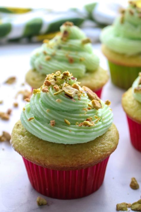 These fluffy light cupcakes are made with a box mix, pistachio pudding and topped with a creamy pistachio buttercream. Light Cupcakes, Pistachio Buttercream, Pistachio Cupcakes, Pistachio Recipes, Fluffy Light, Pistachio Cream, Pistachio Pudding, Pistachio Cake, Vegetarian Cake