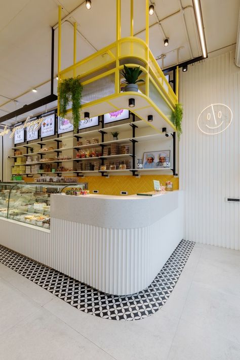 Retail And Cafe Store Design, Corporate Cafe Design, Colorful Bakery Design, 2023 Cafe Design, Indian Bakery Shop Interior, Food Corner Design, Convenience Store Design Interiors, Contemporary Cafe Design, Modern Bakery Design