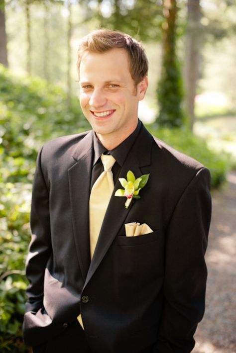 Maybe gray suit with yellow tie Suit With Yellow Tie, Black Suit With Yellow Tie, Black Suit Gold Tie, Black And Yellow Tuxedo, Black And Yellow Groomsmen, Black Suit Yellow Tie, Black Tux Gold Bow Tie, Grey Suit Black Shirt, Gray Suit Yellow Tie