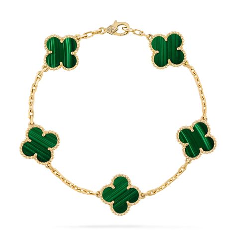 Faithful to the very first Alhambra® jewel created in 1968, the Vintage Alhambra creations by Van Cleef & Arpels are distinguished by their unique, timeless elegance. Inspired by the clover leaf, these icons of luck are adorned with a border of golden beads. Vintage Alhambra bracelet, 5 motifs, 18K yellow gold, malachite. Malachite Van Cleef, Van Cleef Bracelet Gold, Van Cleef Bracelet, Vintage Alhambra Bracelet, Alhambra Bracelet, Classy Purses, Golden Beads, Vintage Vans, Jewelry Lookbook