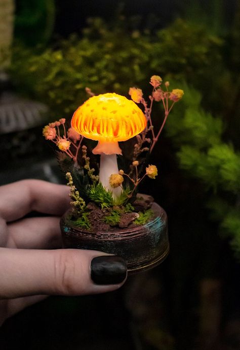 MADE to Order ❄ Mushroom night light ❄ With built-in rechargeable battery The mushrooms are made in a very realistic art-style with precision attention to details that copies the real-mushroom structure and parts.          Materials and features: This handmade lamp is made of Polymer Clay and LED, glass flask with cork lid and with addition of natural and high quality stabilized moss and plants, they are soft, flexible and durable just like the live ones, but unlike them such plants wouldn't wither. It is decorated with natural stabilized moss, tree bark and modeling grass. The lamp might also include genuine hand-sculpted and hand-painted plants. NO CHEAP PLASTIC PLANTS-IMITATIONS IS USED The base is made with use of 3d-print technology by genuine Snowmade templates, the material that is Clay Lamp, Mushroom Lamps, Mushroom Light, Tiny Mushroom, Mushroom Crafts, Glass Flask, Mushroom Lights, Deco Nature, Handmade Lamps